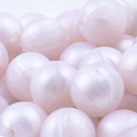 Premium Silicone Beads For Keychain Making And Jewelry Crafting Assorted Sizes With Hella Durable Build in soft pink.