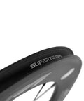 Close-up of Carbon Clincher Wheelset 700C Fixed Gear Wheels 60/88mm Depth With Basalt Braking Surface featuring Superteam branding.