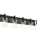 Five light vanity fixture with brushed nickel finish and clear glass shades, modern industrial style for bathroom wall.