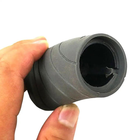 Close-up of a dual lockable handlebar grip, showing ergonomic grooves and soft TPR rubber, part of the set for mountain bikes