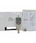 Badass Portable Digital Shore Hardness Tester And Rock Solid Handheld Durometer Gauge With Usb Software For Rapid Rubber And Plastic Testing Sessions Daily Bench Work on a workshop bench with instructional manual.