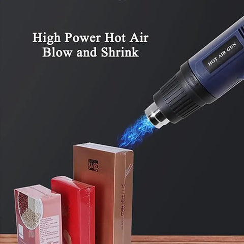 Adjustable hot air gun in use to shrink wrap retail packages, showcasing high power for efficient packing.