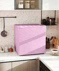 Pink Countertop Mini Freezer 1.1 Cubic Feet Compact Upright in a modern kitchen setting with sunlight casting shadows.