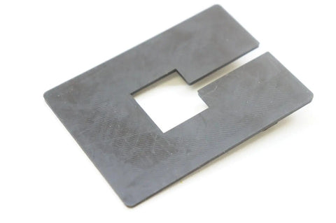 Throat Insert Plate For Rockwell BladeRunner X2 Saw With Precise Throat Opening For Accurate Cuts Easy Quick Swap Fit Enhanced Dust Collection And Durable Construction For Pro Level Rips, black plate with rectangular opening, top view.