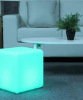 Rechargeable 12 Inch LED Light Cube Stool With Remote Control Mood Lamp Soothing Night Light glowing in living room.