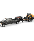 One Thirty Second Scale Big Farm Ram Dually Quad Cab With Lowboy Trailer And SV340B Skid Steer Loader Toy Set in black and orange.