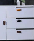 White cabinet with 2 Pack Self Stick Wardrobe Handles With Adhesive For Cabinets Drawers And Doors, black and brown, installed on drawers