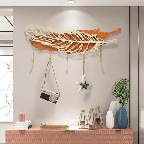 Rock Solid Wall Mount Coat Hooks With Sleek Modern Design Nail Down Easy Setup Versatile Storage Rack For Jackets Hats Keys In Entryway Living Room Or Hallway, featuring a decorative feather design.