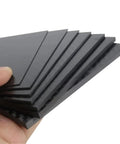 Hand holding Carbon Fiber Plate Panel Sheets 125mm By 75mm Pro Grade 0.5mm To 5mm Thick Heavy Duty Lightweight Composite Material
