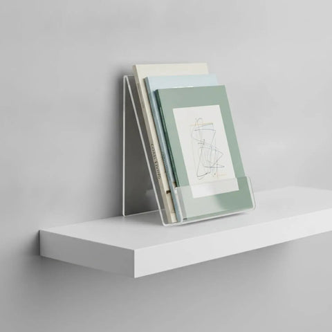 Crystal Clear L Shaped Bookends For Desk And Shelf Organization holding books on white shelf
