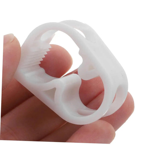 Close-up of hand holding 20 Pack Adjustable Flow Control Hose Clamps White Plastic Tube Valves For Lab Work Brewing Irrigation