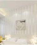 European Modern Minimalist Country Stripe Wallpaper Roll For Living Room Bedroom And TV Backdrop In Cream White Non Woven Eco Friendly Material With Rich Texture Subtle Gloss And Enhanced Depth For A Cozy Home Vibe displayed in a bedroom setting.
