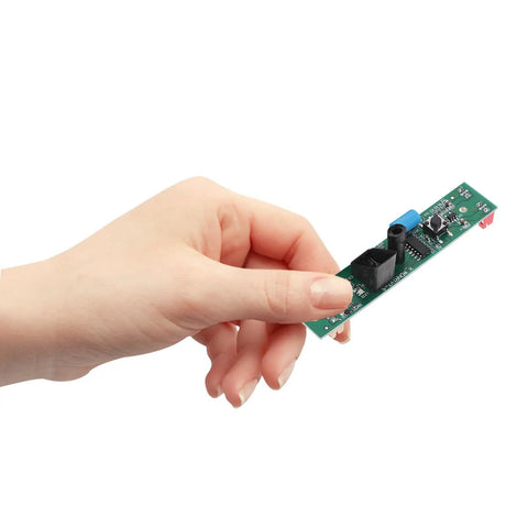 Hand holding Smart Trash Can Sensor Board Replacement With Reliable Performance And Easy Install For Household And Kitchen Garbage Bins Plastic And Metal Circuit Board Parts For Touchless Waste Bin