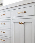 Antique Brass Cabinet Handles Set Of 6 192mm Retro Drawer Pulls Zinc Alloy Vintage Kitchen Hardware installed on white cabinets.