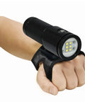 VL 4600 Lumen Video Light with Crisp 6500K output, 120 degree beam mounted on glove, four power levels, battery indicator visible