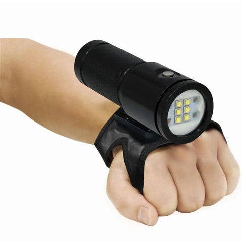 VL 4600 Lumen Video Light with Crisp 6500K output, 120 degree beam mounted on glove, four power levels, battery indicator visible