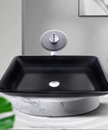 Top Tier Slick Black Rectangular Vessel Sink Built From Heavy Duty Tempered Glass With Smooth Swivel Faucet And Clean Countertop Style For Quick Bathroom Refresh Upgrades - modern design with round faucet on black basin.