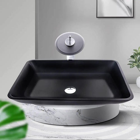Top Tier Slick Black Rectangular Vessel Sink Built From Heavy Duty Tempered Glass With Smooth Swivel Faucet And Clean Countertop Style For Quick Bathroom Refresh Upgrades - modern design with round faucet on black basin.