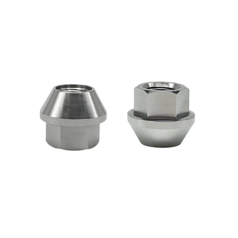 Two Titanium Lug Nuts from a 20 Piece Open End Set M12x1.5x20mm with Burnt Blue finish, Aerospace Grade, conical seat visible.
