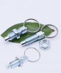 Four Pack Beefy Carbon Steel Indexing Plungers Featuring Retractable Spring Loaded Pull Rings M10 Thread Quick Detent Pins on green leaf.