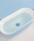 2pcs Silicone Bathtub Plug Drain Stopper Flexible Flat Cover in a modern blue bathtub with water, showing drain design.