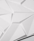Lit 3D PVC Wall Panels Matte Black Geometric Decor Kit For DIY Accent Walls close-up, showcasing geometric texture and design detail.