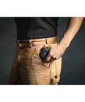 Person holding a pocket-sized Two Mic Wireless Microphone System With Charging Case For Smartphones USB C No Cable Needed Quick