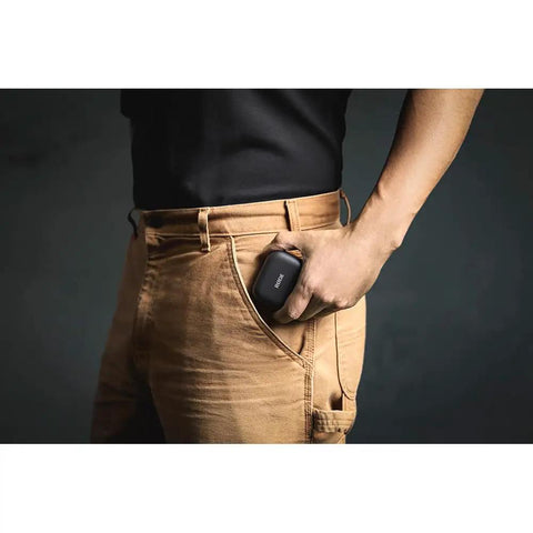 Person holding a pocket-sized Two Mic Wireless Microphone System With Charging Case For Smartphones USB C No Cable Needed Quick
