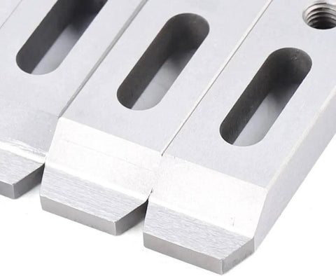 Close-up of Pro Grade Stainless Wire EDM Jig Holder Set, 4-Piece Fixture Board Fixturing Tool with M8x1.25 Screws, stainless steel construction.