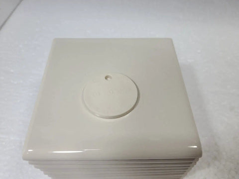 Stack of Beige Bone Almond Ceramic Bullnose Tile 4x4 Square Trim With Curved Edge 9 Piece Box Classic Color 006 visible from above.