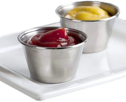 Stainless Steel Sauce Cups Set 12-Pack Small Dipping Ramekins for Condiments shown with ketchup and mustard