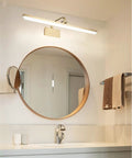 Lit Vanity Light With Brushed Brass Arc Arm Sconces Long Acrylic Linear Wall Light in Gold over round bathroom mirror