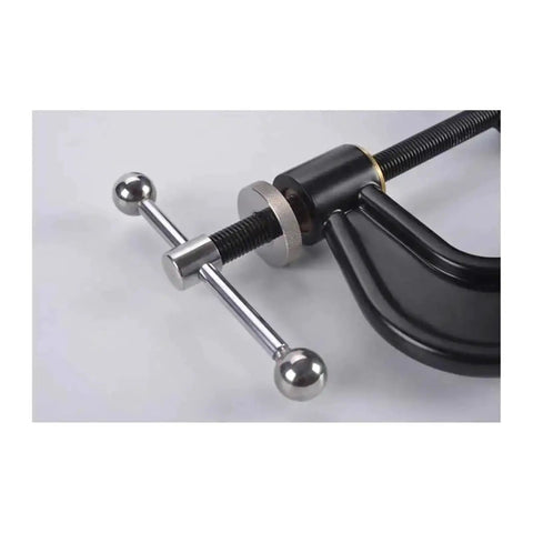Slick Digital Hardness Tester Featuring C Clamp Portable Durometer Gauge for Steel Copper and Aluminum showing the clamp mechanism.