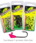 Gold One Sixty Fourth Ounce Shad Dart Jig Heads Twenty Five Pack With Lure Body Securing Barb For Balanced Jigs And Hooks Built For Serious Fishin Trout Crappie Bass Panfish In Freshwater And Saltwater - front view of three packaging boxes with pink jig head displayed.