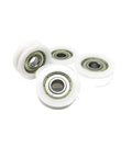 U Type Groove Bearing Wheel Set 8x40x10 Mm Nylon Track Guide Roller Pulley With 8 Mm Bore And 40 Mm Diameter showing four white POM wheels