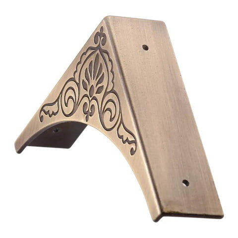 Antique Bronze Metal 4 Pack Corner Protectors Furniture Edge Guards With Classic Carved Details close-up angle.