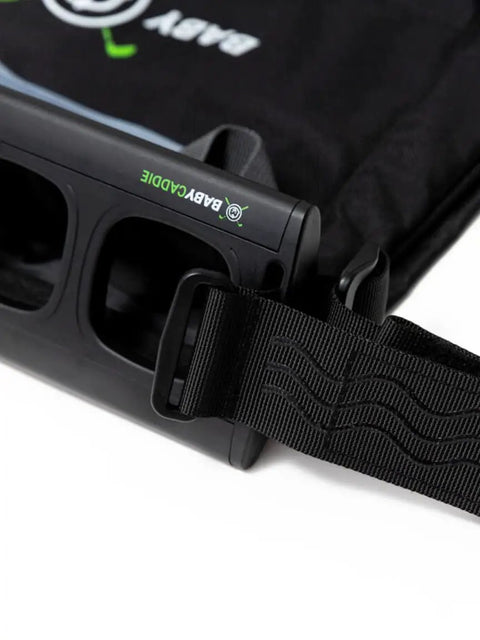 Close-up of a black Stroller Golf Bag Organizer strap, showing sturdy design and part of golf bag attachment detail.