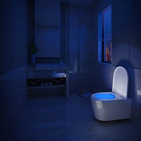 Bathroom with blue-glowing toilet using 3 Pack Rechargeable 16 Color Motion Sensor LED Toilet Night Lights With 5 Stage Dimmer IP67 Waterproof Light Detection No Batteries Needed Easy Install.