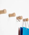 No Fuss Solid Wood Wall Hooks Holds Bags Hats And Coats Game Changer In Home Organization Multi Purpose Coat Rack with blue bag