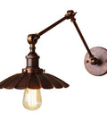 Industrial Wall Sconce With Built In Toggle Switch Sets The Mood For Cozy Bedroom Lighting Boasting Solid Cast Iron Construction nailing that vintage vibe.