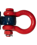 Close-up of a red shackle attached to a 8 Ton Snatch Block With Shackle Crane 6 Inch Sheave For Three Quarter To Seven Eighth Inch Wire Rope.