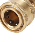 Close-up of a Three Eighths Inch To M22 Male Quick Release Pressure Washer Connector Copper Adapter with gold finish.