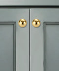 Snap Up Five Pack One Inch Unlacquered Solid Brass Cabinet Knobs Round Retro Pulls No Fuss Install For Kitchen Drawers And Closets Total Room Refresh Standout on gray cabinet doors.