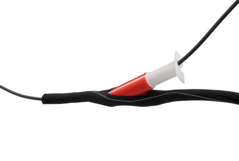 Wire Loom Insertion Tool Set For Three Eighths To Two Inch Conduit Sleeving in use with black cable bundle