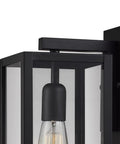 Close-up of One Light Outdoor Indoor Wall Sconce Dope Matte Black Finish With Clear Glass Shade Weather Resistant Modern Exterior Lighting
