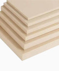 Stack of hard wearing PEEK plate material engineering plastic sheets, 50x50mm or 50x100mm, 3mm to 20mm thick for prototyping.
