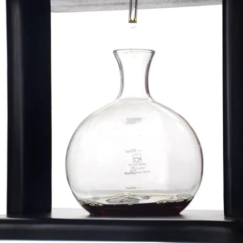 Premium Handmade Glass And Wooden Cold Brew Coffee Maker With Adjustable Copper Drip Valve and Large One Liter Ice Drip Tower, glass vessel with coffee drip.