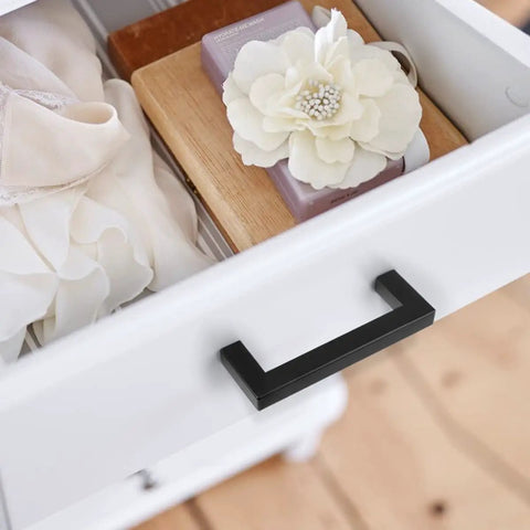Slick Matte Black Square Bar Cabinet Pulls 5 Pack With 3 3/4 Inch Hole Centers Heavy Duty Stainless Steel Drawer Handle on white dresser.