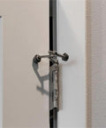 Satin Nickel Hinge Pin Door Stops Kit, 10-Pack, Adjustable 85-125 Degree Swing in use on door with rubber bumpers and zinc alloy build.