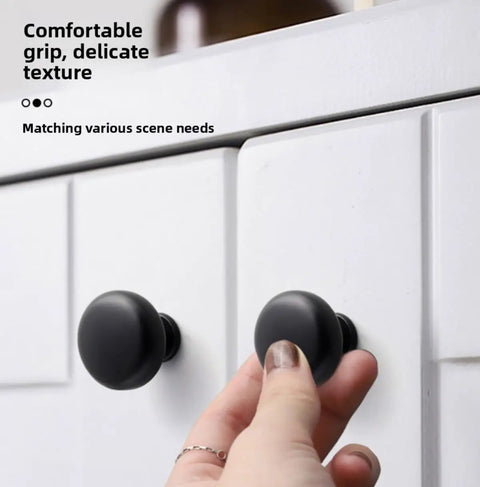 Hand gripping brushed nickel cabinet knobs and pulls for drawers and closet doors fingerprint resistant durable kitchen and bathroom hardware